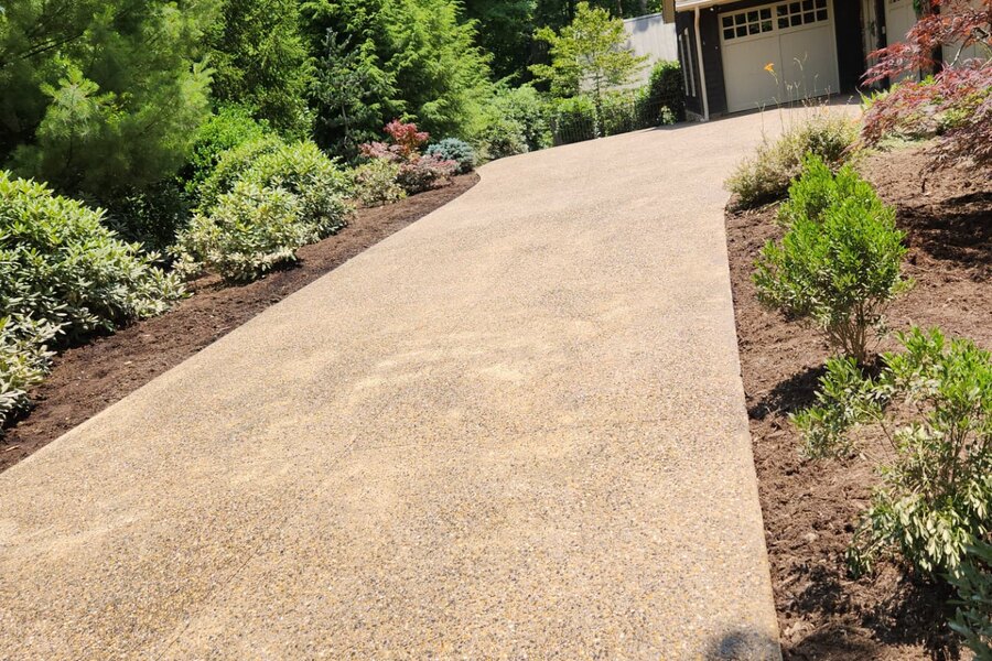 Replacement concrete driveway on a sloped residential lot in Asheville, NC
