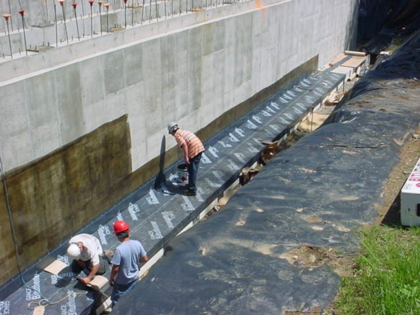 Concrete foundation walls with rebar reinforcement on a hillside build near Asheville, NC